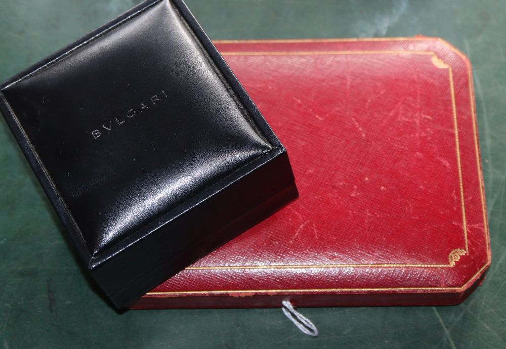 A Cartier gilt tooled red leather cigarette case? box, 15.4cm and a Bulgari jewellery box.